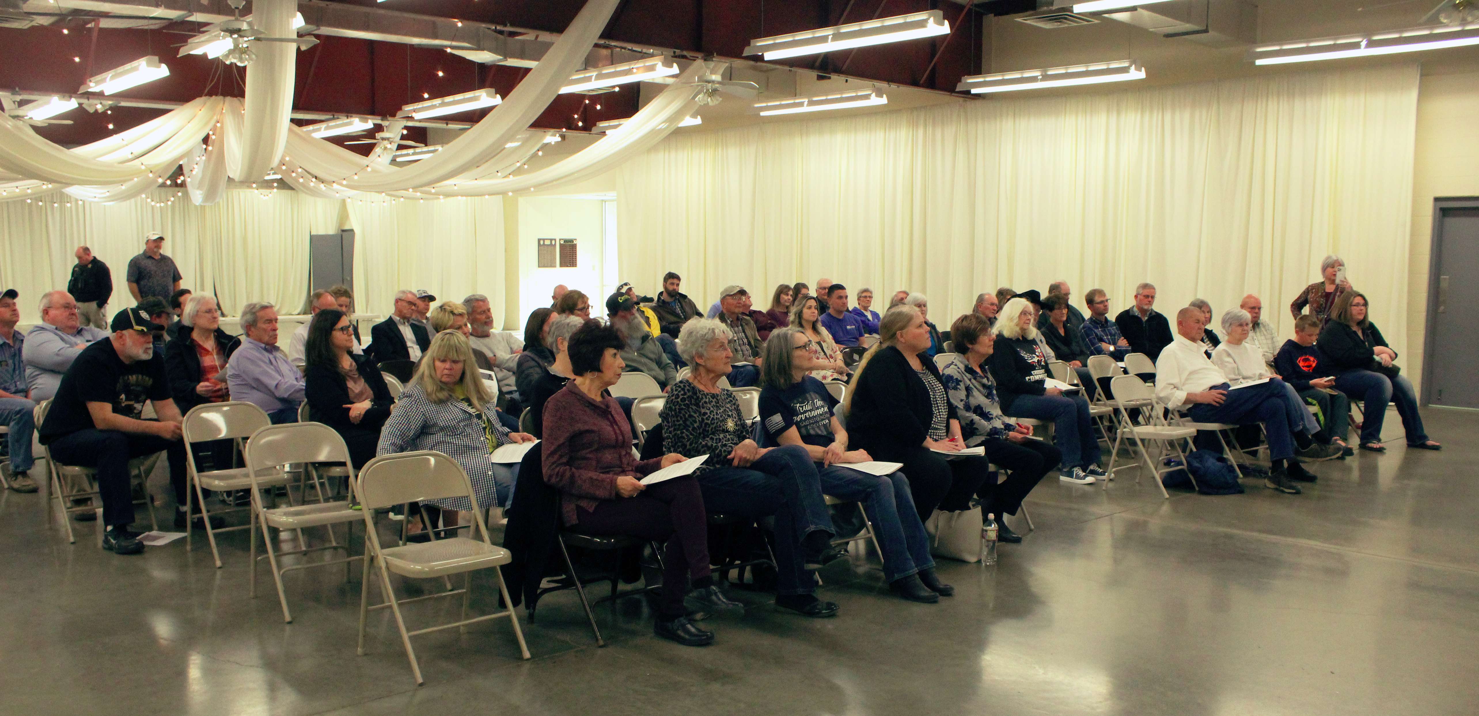 A group of about 60 people gathered to discuss the USD 489 bond issue Tuesday night. The group included people for and against the bond. Photo by Cristina Janney / Hays Post<br>