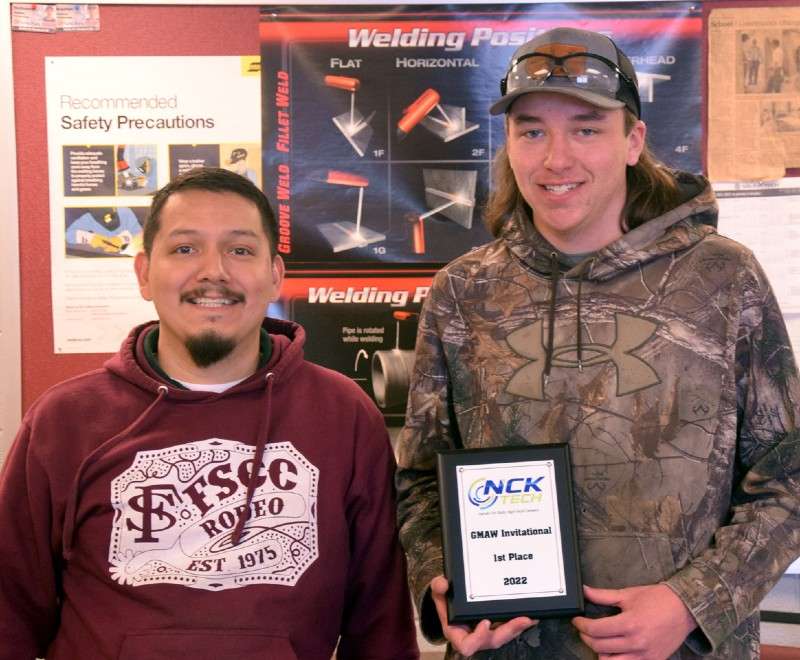 <b>Fernando Fajardo, Salina Tech welding instructor, and welding student Trevor Johnson, a senior at Salina South High School. Johnson placed first at the&nbsp;Gas Metal Arc Welding Invitational.</b> Photo courtesy Salina Tech