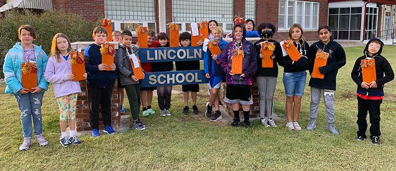 Monica Dreiling's fifth-grade class made wooden pumpkins that were gifted to their Lincoln school neighbors this fall. Courtesy photo<br>