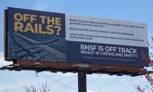 One of the billboards sponsored by a union representing workers at BNSF Railways. (Paul Hammel/Nebraska Examiner)