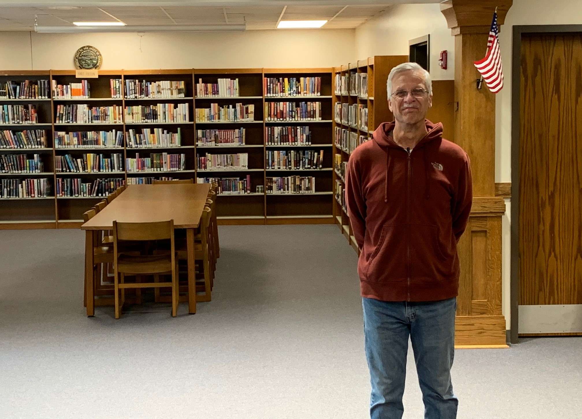 Bushton City Councilmember Alan Siemer in the library