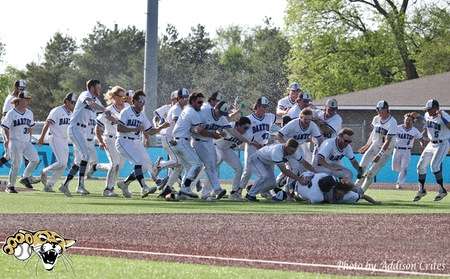Barton Baseball team celebrates after clinching the KJCCC West Title - Barton Athletics