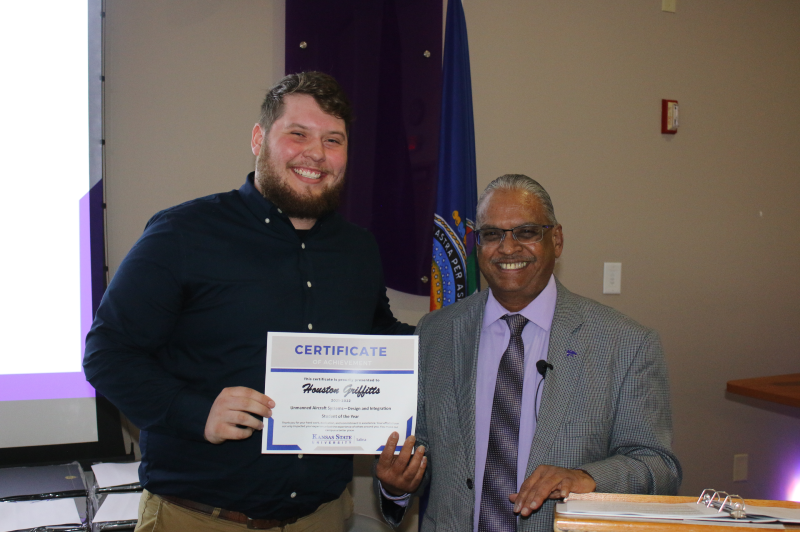 <b>Houston Griffitts, left, a junior in unmanned aircraft systems integration and design at Kansas State University Salina, will intern at General Atomics this summer. He earned the opportunity after networking at a K-State Salina career fair in fall 2021.&nbsp;Griffitts is a graduate of Salina Central High School.</b> Photo courtesy&nbsp; K-State Salina