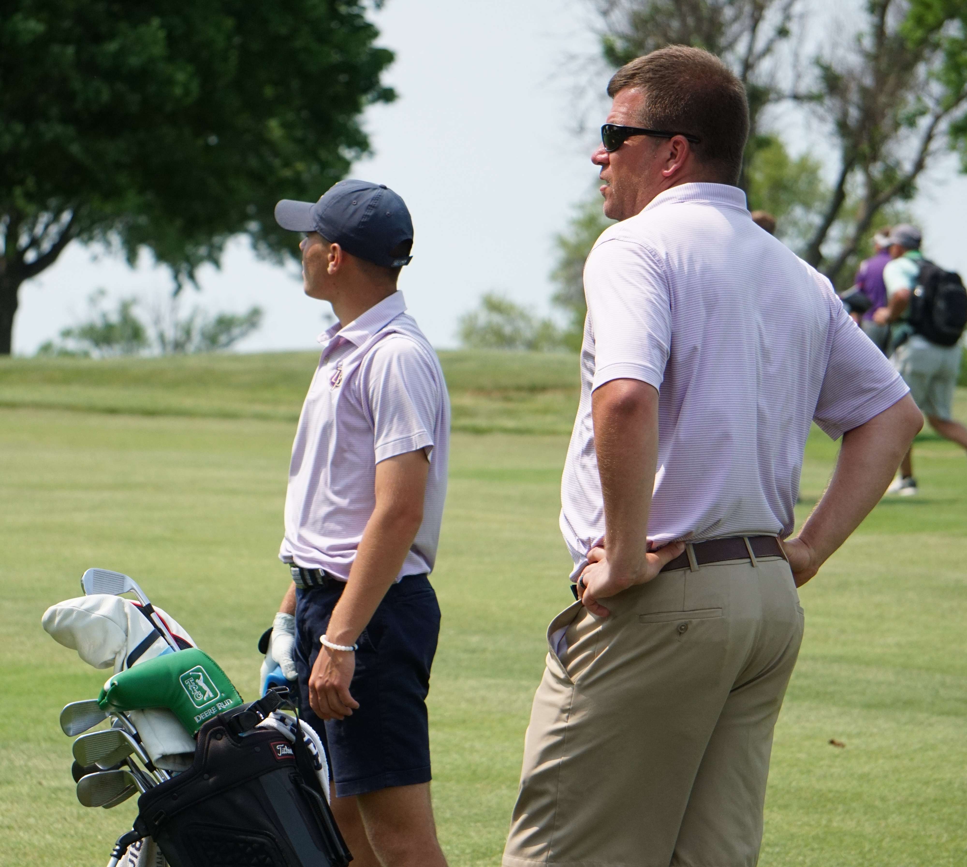 Mitch Girres and Sam Schoeberl on the last hole.