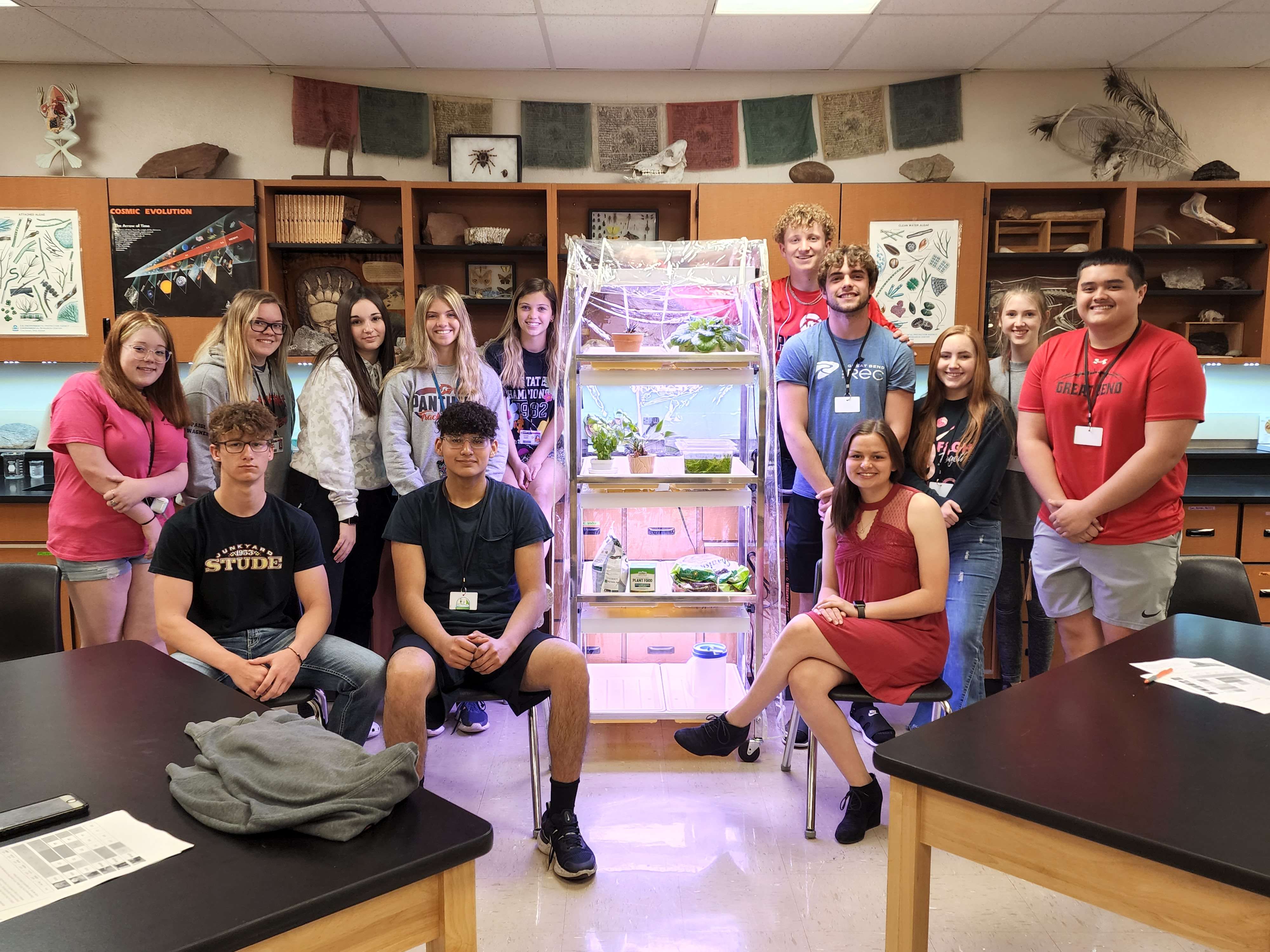 GBHS honors biology students extend gratitude to Midwest Energy for a grant that helped fund the addition of a growth cart in Mr. Botzung's science lab. Front Row: Kamron Stude, Angel Palacio, Melyne Fletchall. Back Row: Anita Zecha, Paige Wagner, Kynslee White, Katie Kuhlman, Charley Sander, Johnathan Randall, Evan Wedel, Hailey Hicks, Elysse Ellis and Jason Scott.