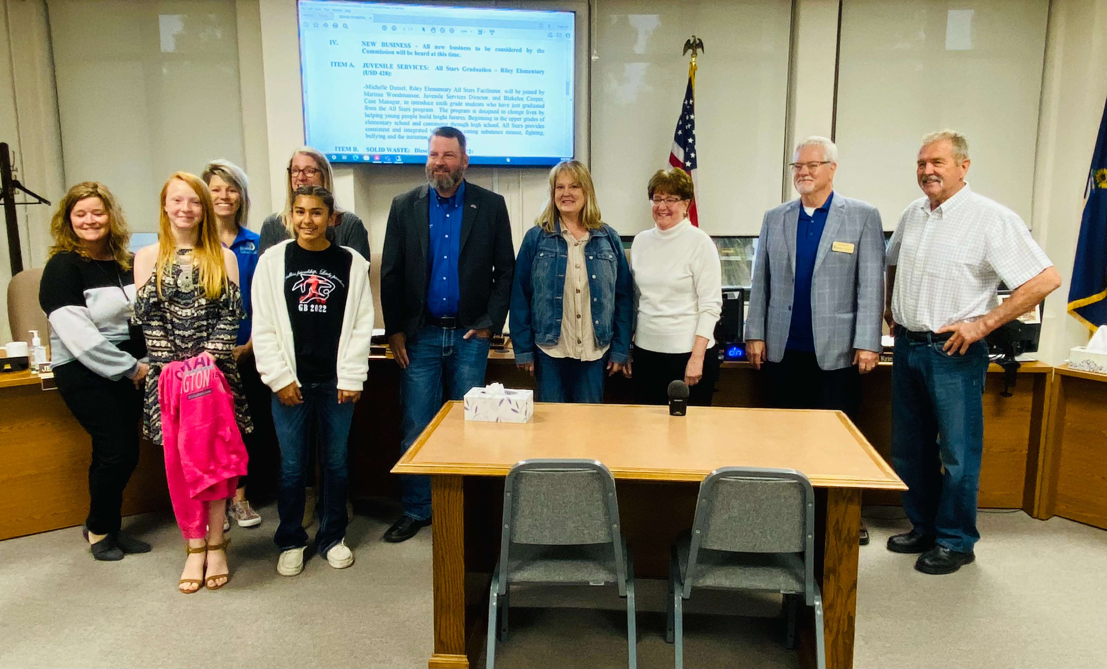 A pair of students facilitators of All Stars pose for a picture with the Barton County Commission on Wednesday, May 25, 2022. All Stars is an intervention program to reduce adolescents' engagement in risk behaviors such as substance abuse, violence and sexual activity.