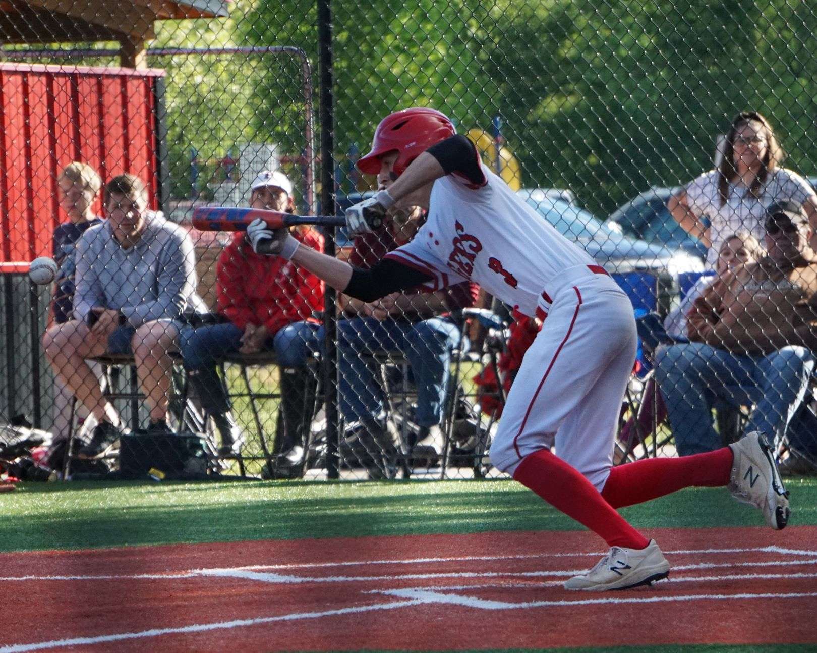 Brock Steggall lays down a bunt in the first inning.