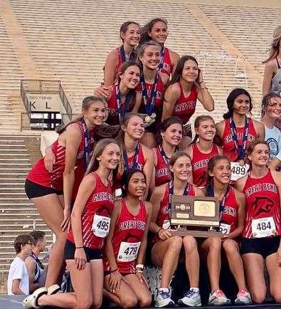<b>The Great Bend Lady Panthers show off their 2nd place trophy on the awards stand following the 2022 State Track Meet at Cessna Stadium.</b>