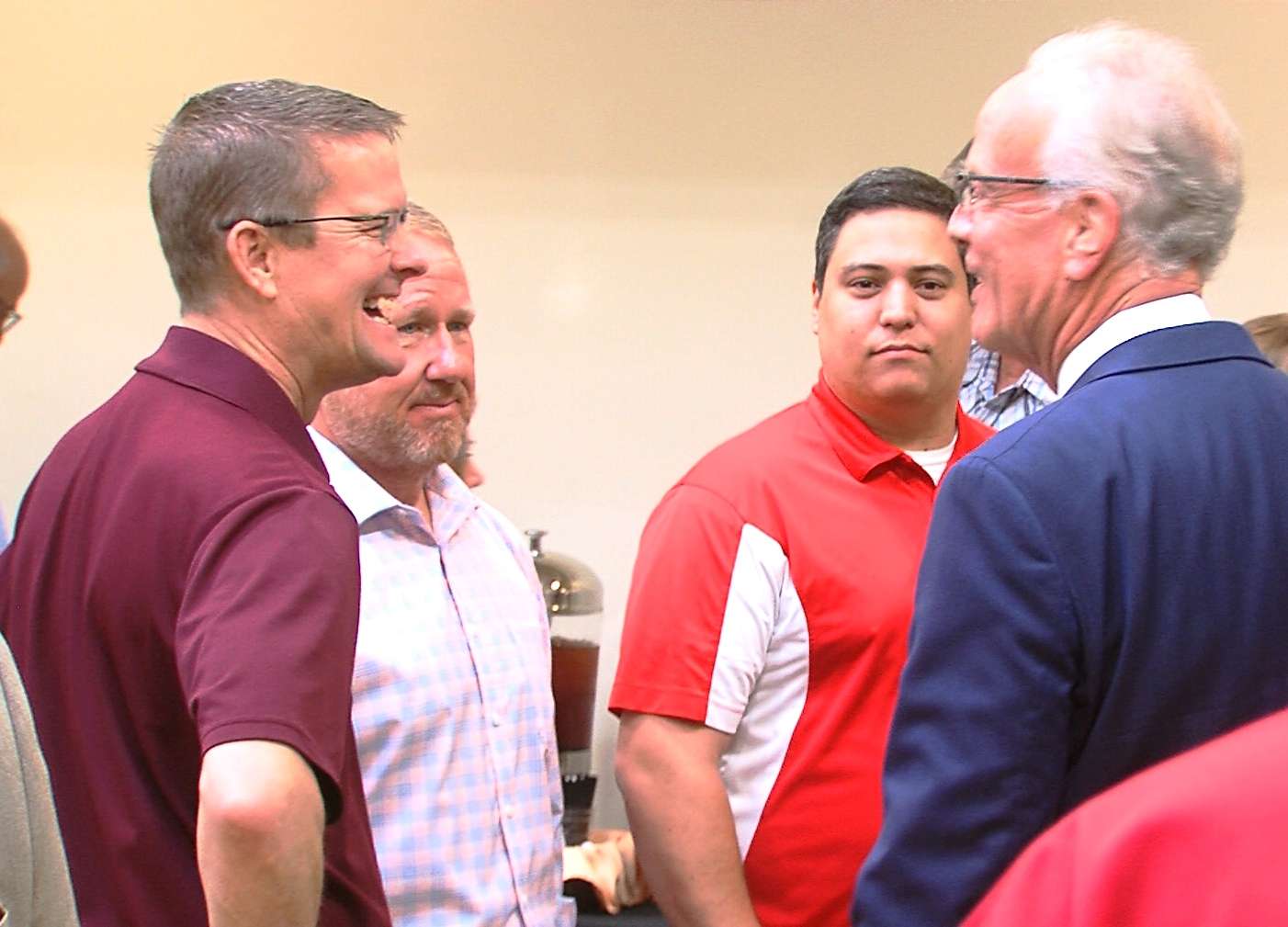 Shaun Musil,&nbsp;Hays city commissioner, Toby Dougherty, city manager, and Mason Ruder, mayor, visit with Jerry Moran, U.S. senator, during the StonePost Lofts open house.&nbsp;