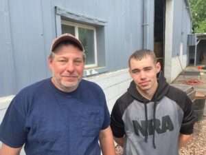 Kevin Good, left, and his son, Trevor, are hoping that a new grant program will help them resurrect a small meat locker north of Leigh destroyed by a tornado in December. (Paul Hammel/Nebraska Examiner)