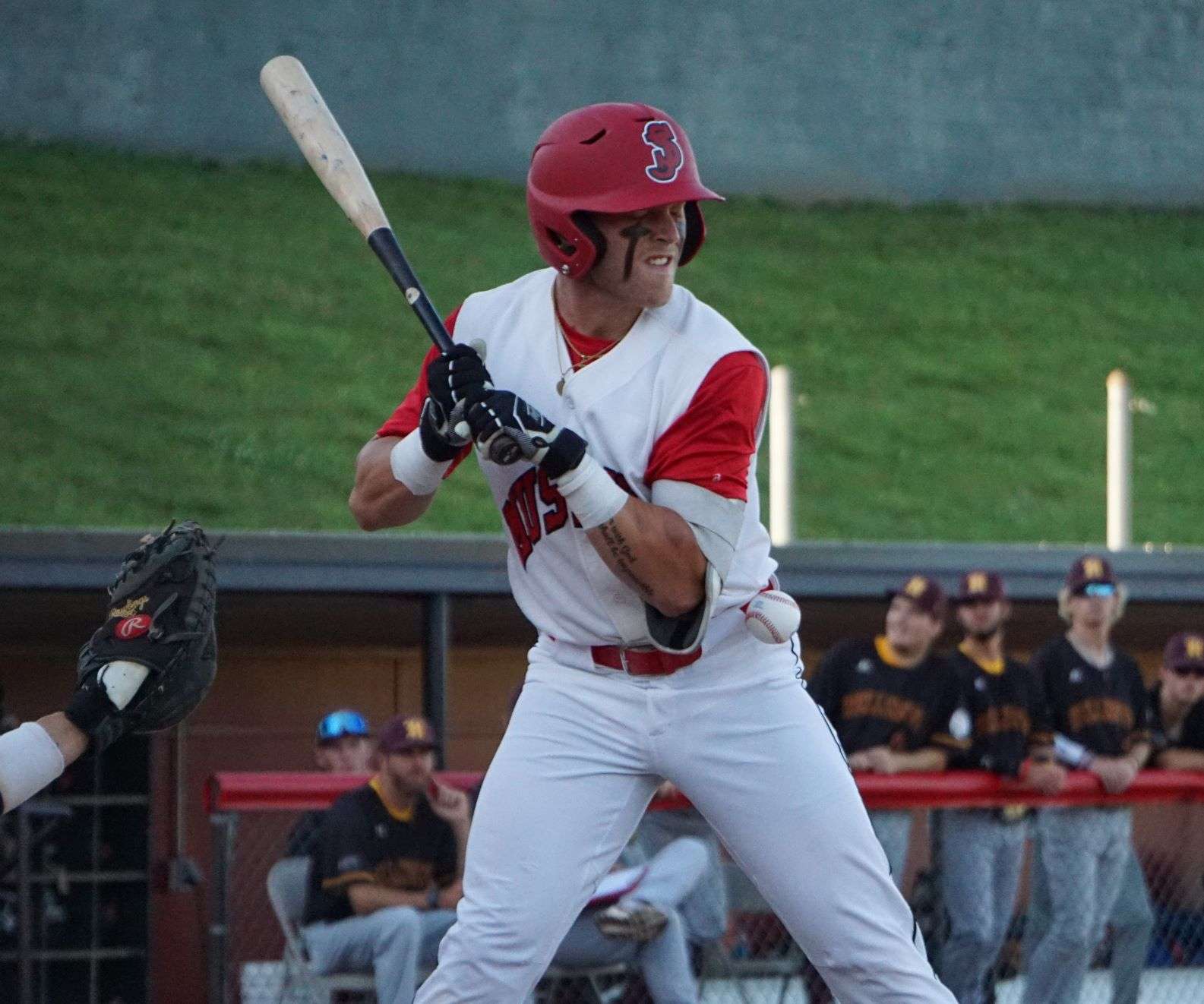 Trevor McCollum gets hit by a pitch in the first inning.