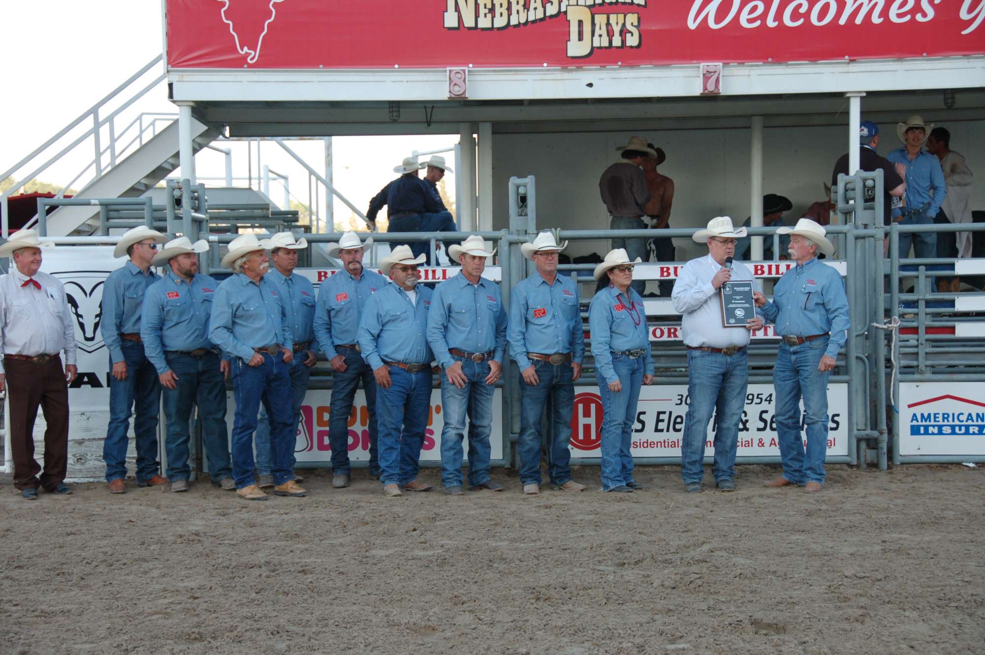 The Buffalo Bill Rodeo was awarded a plaque for its 75 years of membership in the PRCA. Jack Morris, on the far right, and Shelli Arensdorf, third from the right, accept the award from PRCA CEO Tom Glause. Photo by Jerry Woodruff.