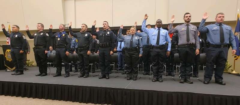 <b>Members of the Kansas Law Enforcement Training Center's 295th basic training class take their oath Friday.</b> Photo by Jason Levy courtesy KLETC