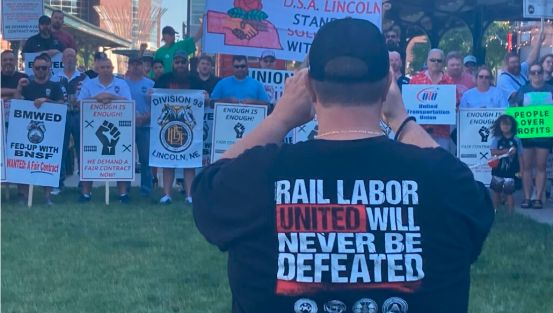 More than 100 members of railroad unions rallied Sunday in LIncoln outside of a BNSF Railway office for better wages and working conditions. (Paul Hammel/Nebraska Examiner)