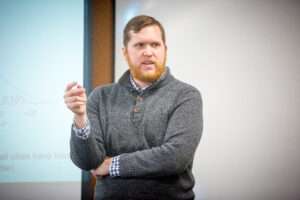 Pierce Greenberg’s expertise is in sociology and spacial inequality, which is the unequal distribution of resources and services. (Courtesy of Creighton University)