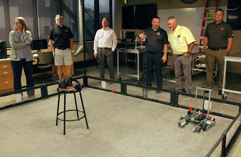 The FHSU STEM lab in the Center for Applied Technology. At the center of the room is virtual reality goggles that are used with 3-D modeling programs. To the right is the FHSU robot that took third at the national robotics competition this year. Photo by Cristina Janney/Hays Post<br>