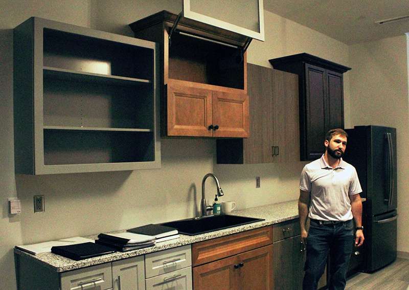 This demonstration kitchen allows interior design students to see examples of kitchen cabinets and fixtures. The samples were a donation to the program, which is the second largest within the art department. Photo by Cristina Janney/Hays Post<br>