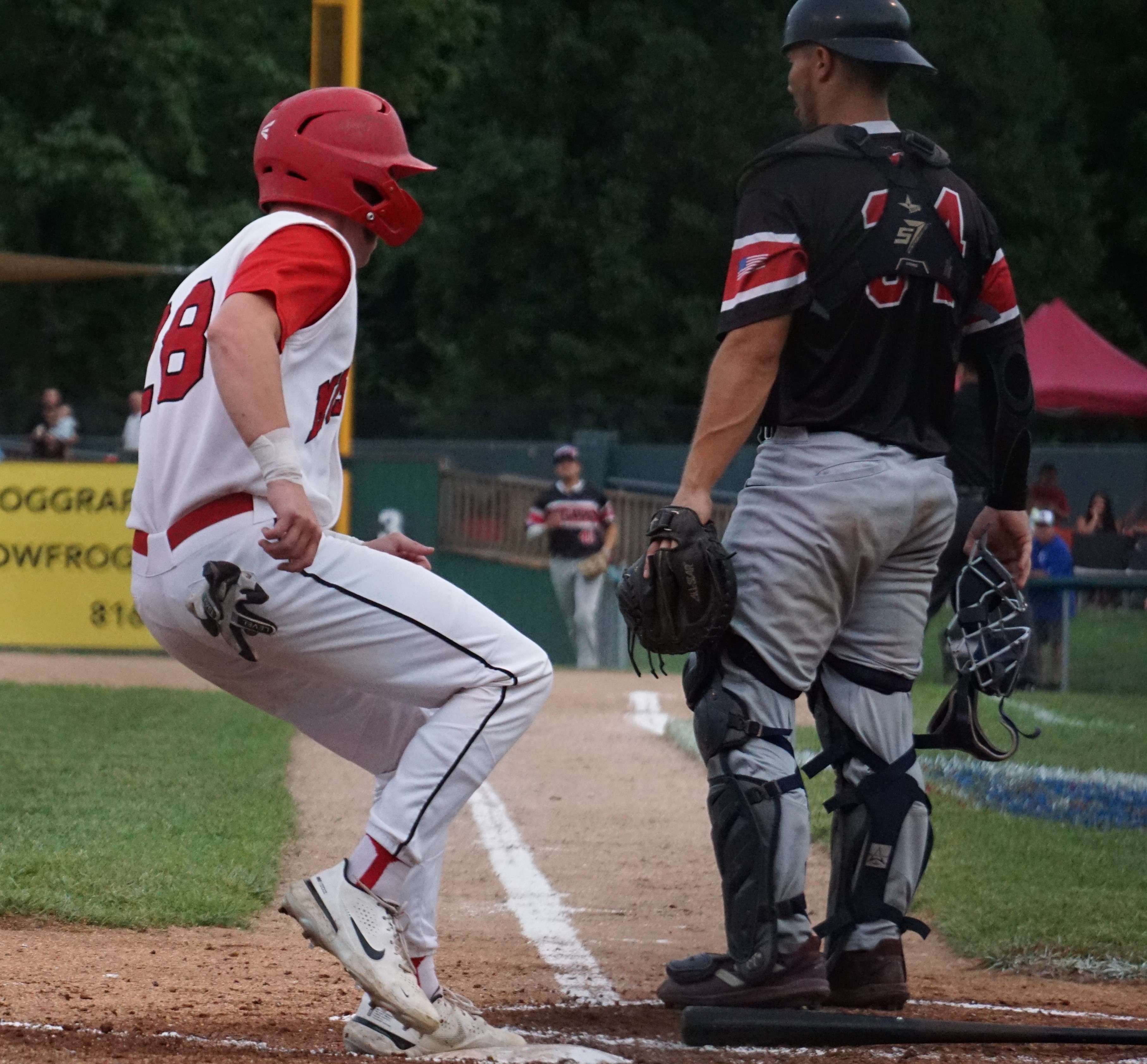 Tyler Petrosino scores a run in the third.