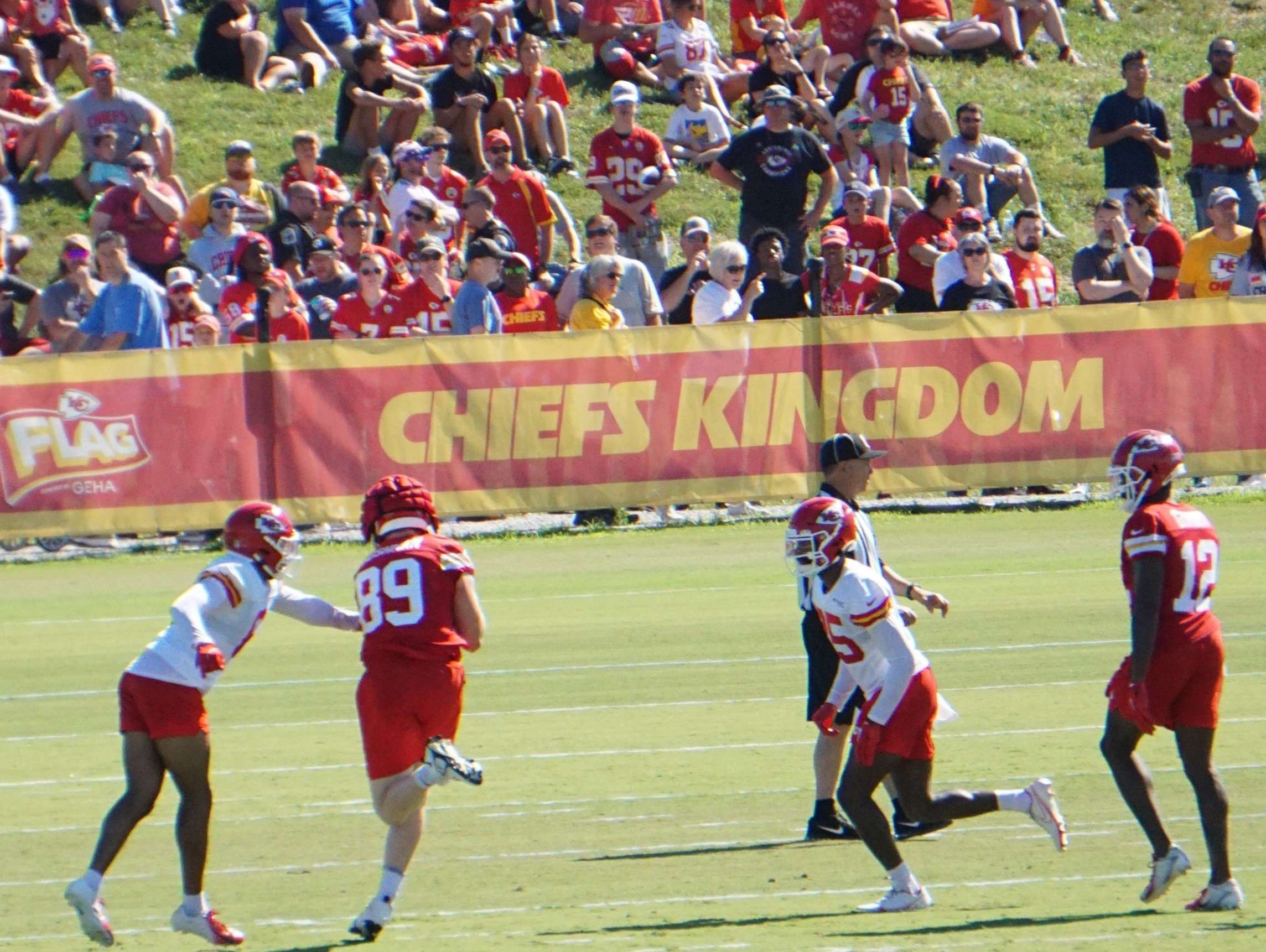 Matt Bushman (89) catches a pass in coverage. Photo by Tommy Rezac