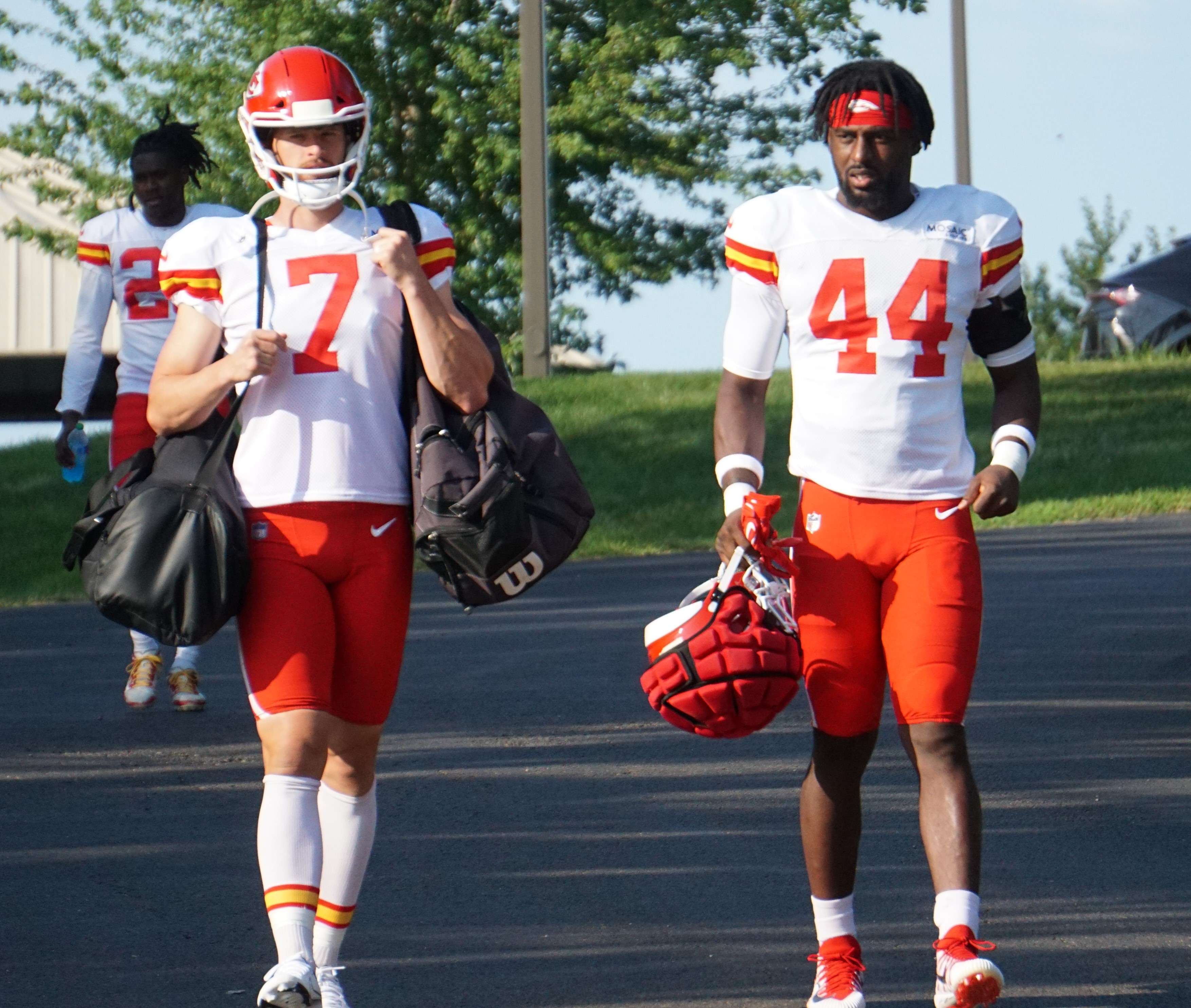 Harrison Butker (7) and Elijah Lee (44).