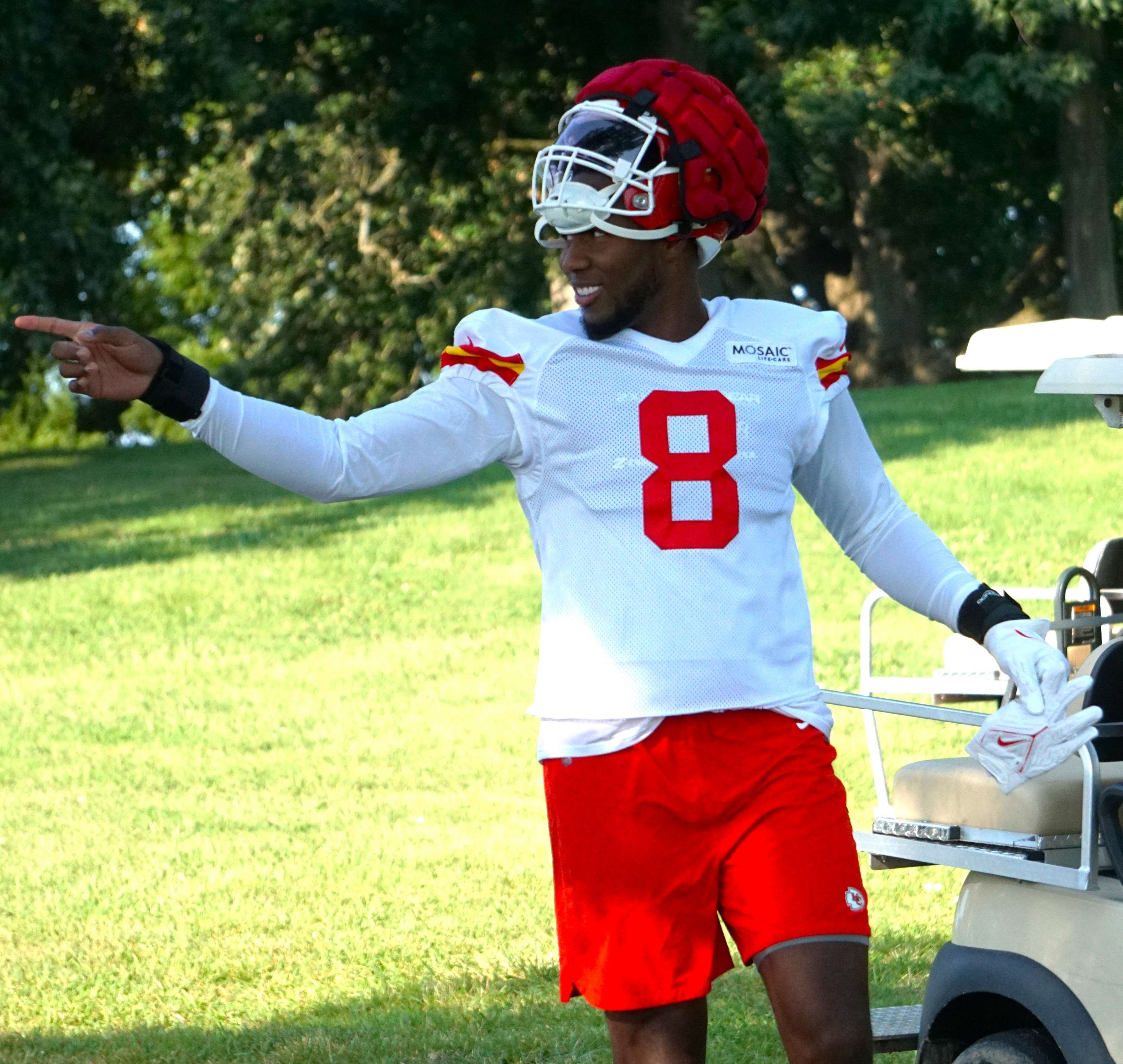 Defensive end Carlos Dunlap greets fans as he makes his way to his first Chiefs training camp practice on Thursday morning at Missouri Western. Photo by Tommy Rezac.