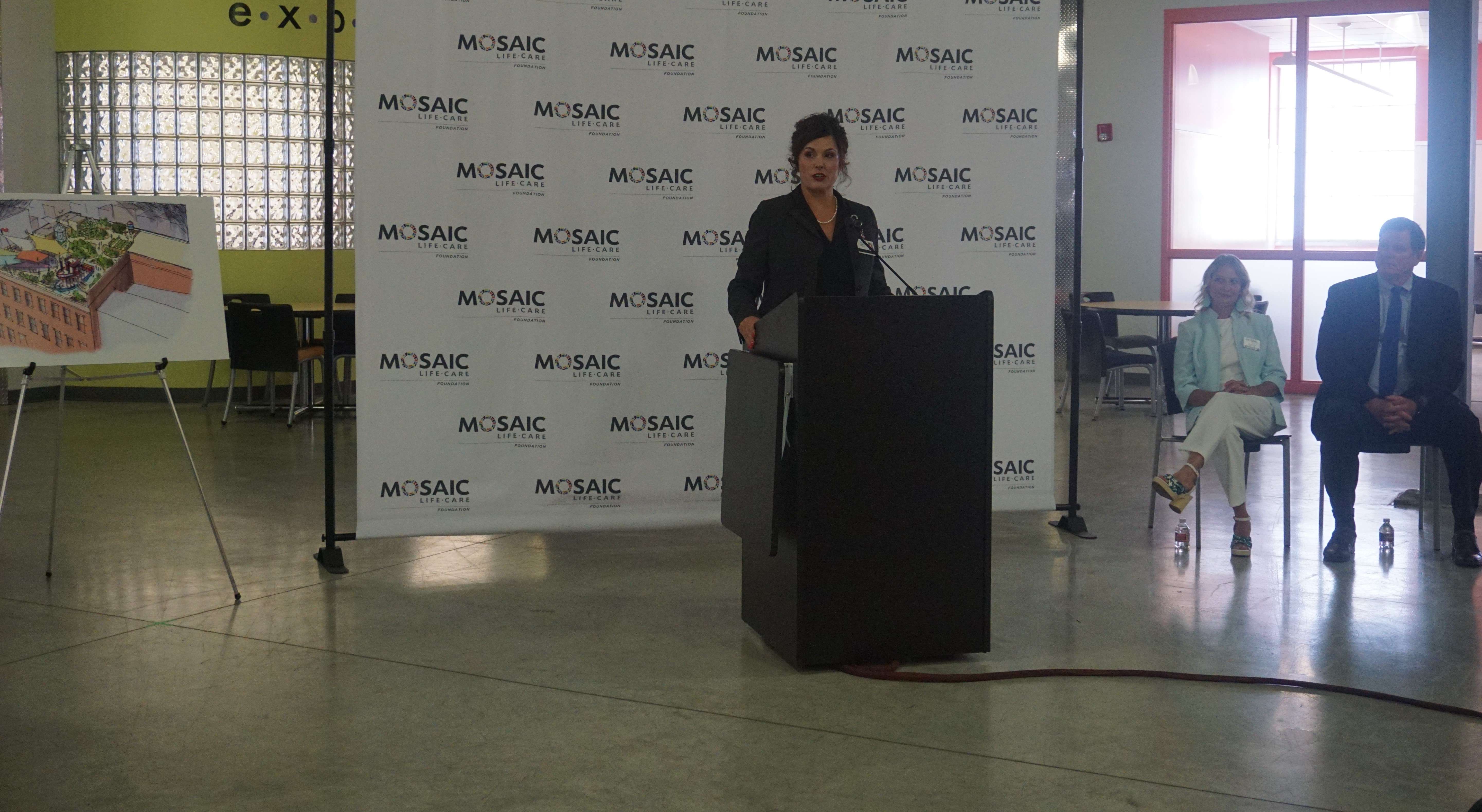 President of the Mosaic Life Care Foundation Julie Gaddie speaks to a crowd at EmpowerU in downtown St. Joseph about the Mosaic Children's Discovery Center/ Photo by Matt Pike