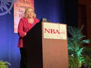 State Sen. Carol Blood speaks in La Vista to the Nebraska Bankers Association. (Aaron Sanderford/Nebraska Examiner)