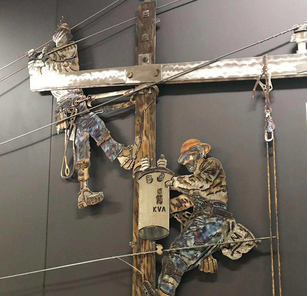 'After the Storm' Hoisington artist depicts linemen in new piece