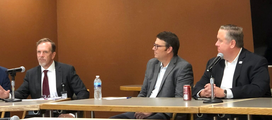 From left, Darrell Missey, director of Missouri’s Children’s Division, speaks at an Aug. 13 press briefing alongside Todd Richardson, director of MO HealthNet, and Robert Knodell, acting director of the Department of Social Services (Clara Bates/Missouri Independent).