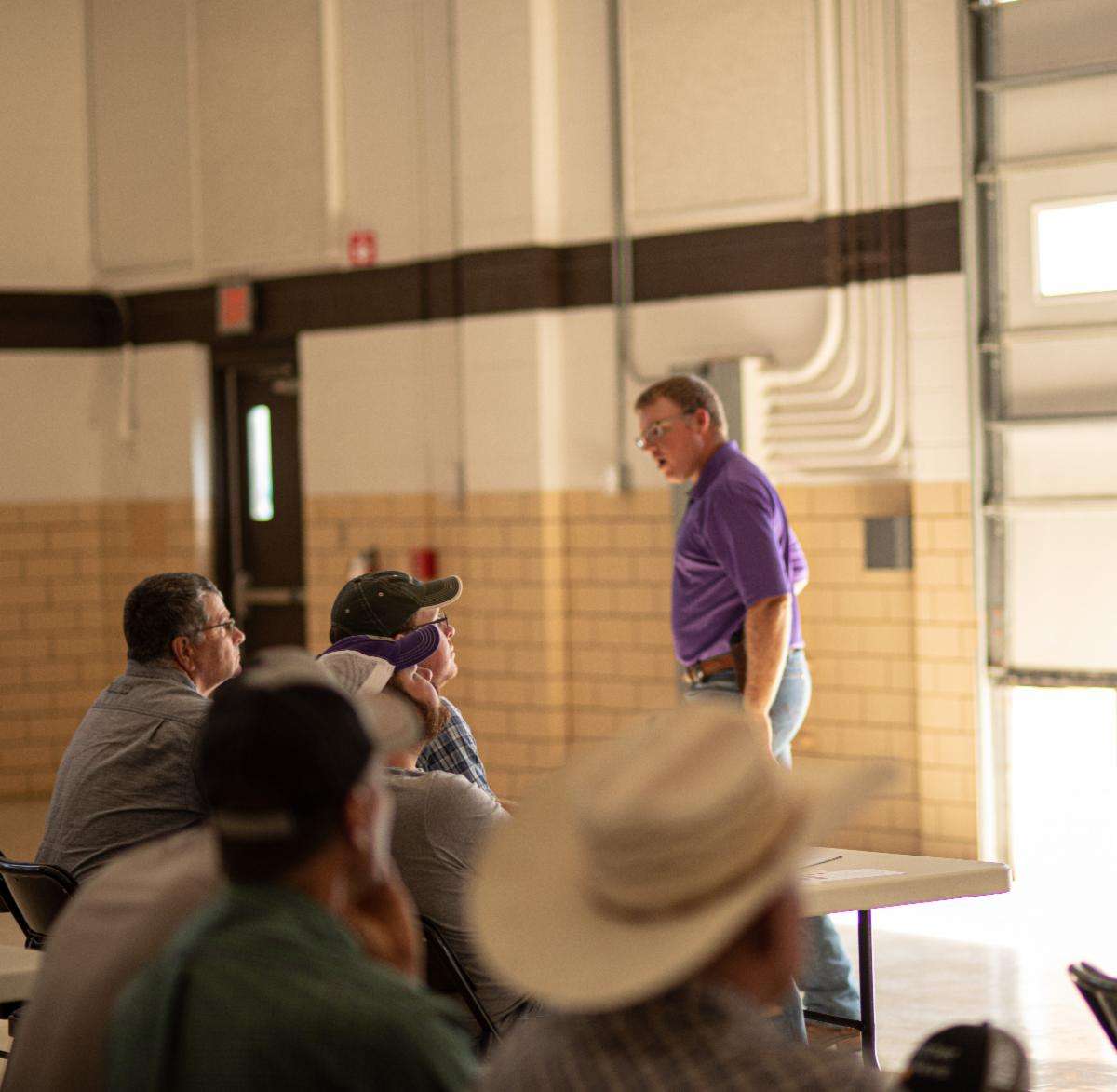 Farmers listened to K-State's Lucas Haag at the Wheat Rx Seminar in Phillipsburg