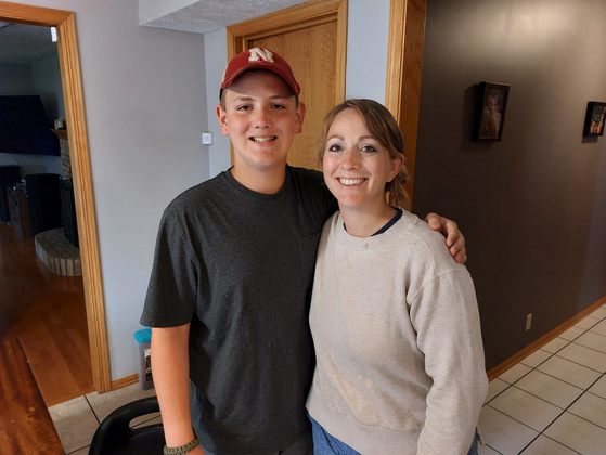 Thirteen-year-old Daniel Miller (left) was waitlisted for a detasseling job this summer. His mom, Katie Miller, detasseled as a teenager and hopes her son can try again next year. Will Bauer / Nebraska Public Media News