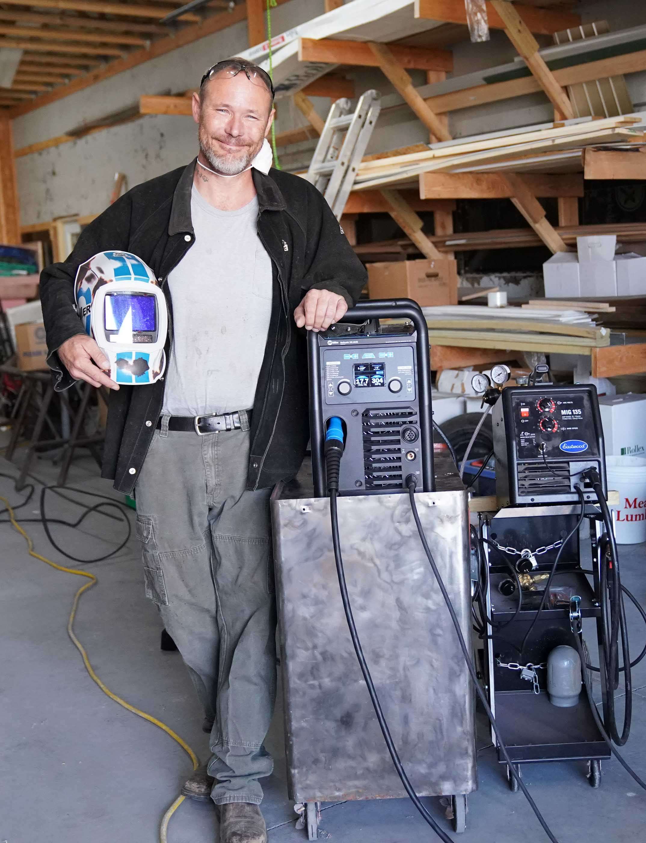 <i>Tim Ledford puts together a lamp for a customer Friday morning in Grant. Ledford is an alum of Mid-Plains Community College and the owner of Patriot Welding.</i>