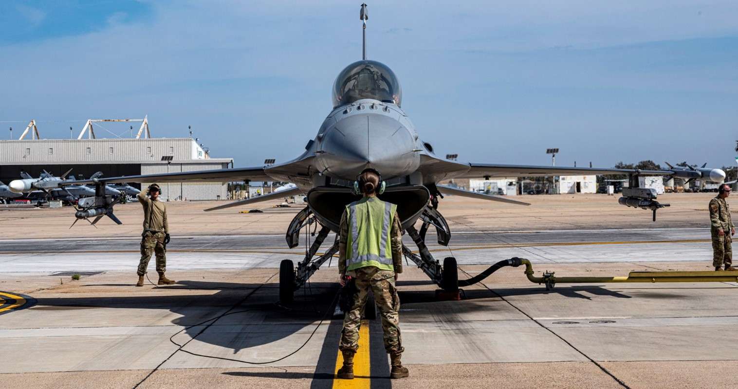 U.S. Air Force Senior Airman Annalisa Neal, Crew Chief, 140th Wing, Colorado Air National Guard, prepares to launch an F-16C Fighting Falcon aircraft in support of a joint operations training mission with the 101st F-18 Hornet Training Squadron at Miramar Marine Corps Air Station, Aug. 3, 2022, San Diego, California. The 140th Wing is comprised of over 1,600 people who support multiple operational missions and are headquartered at Buckley Space Force Base, Aurora, Colorado. (U.S Air National Guard photo by Master Sgt. Amanda Geiger)