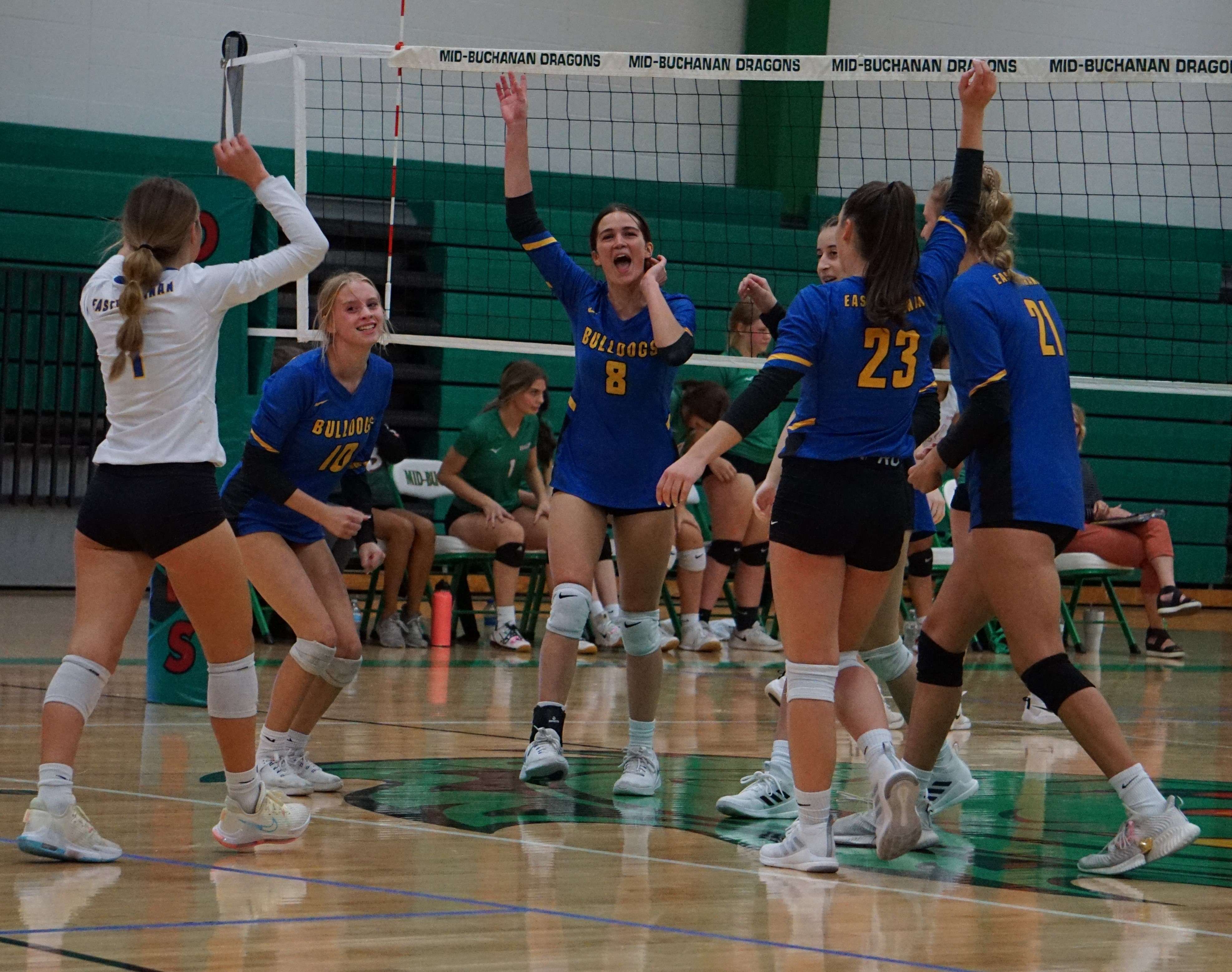 East Buchanan celebrates a victory in the third set.