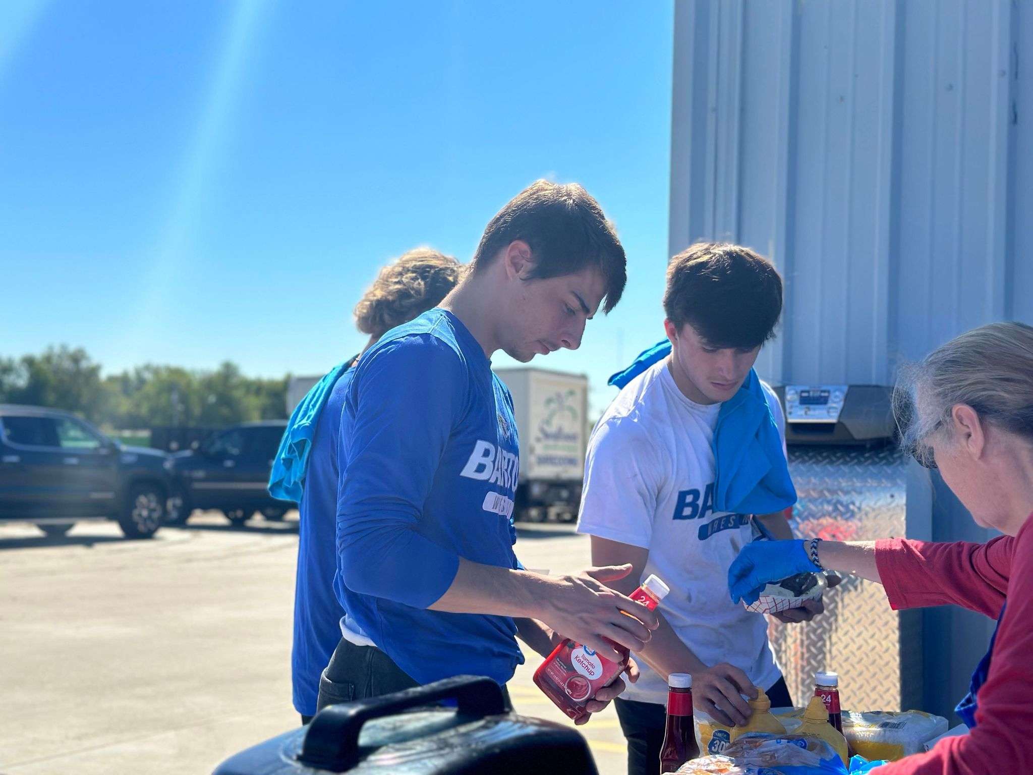 Members of the Barton Community College wrestling team were among the volunteers Saturday.