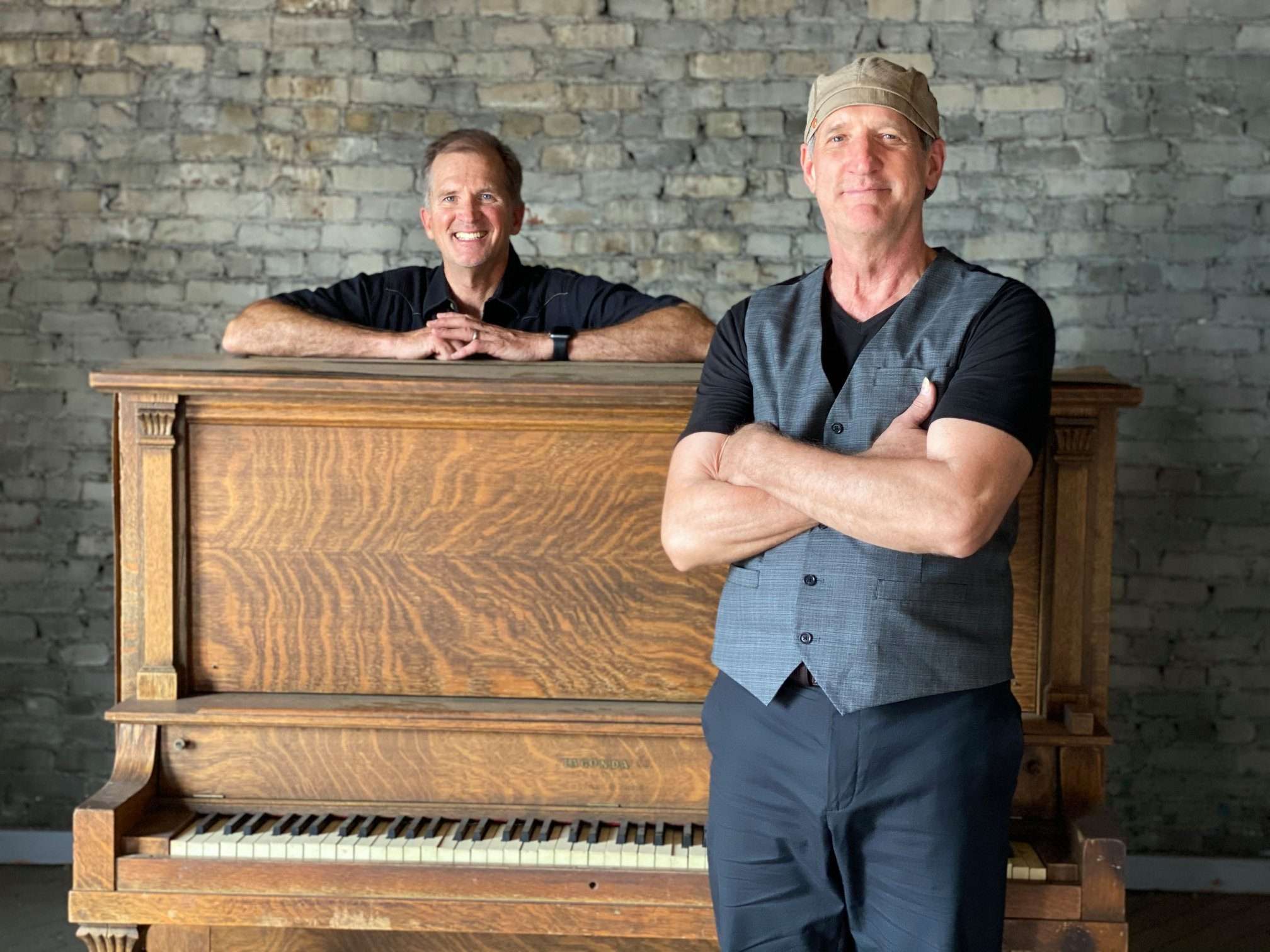 Steve Leslie, right, will perform “How Sweet It Is,” a tribute to James Taylor, for members of the Golden Belt Community Concert Association at 7:30 p.m. Monday, Oct. 3, in the Great Bend Municipal Auditorium, Lakin and Stone. Doors open at 6:30 p.m. At left, behind the piano is Leslie’s accompanist, Kyle Tupper.