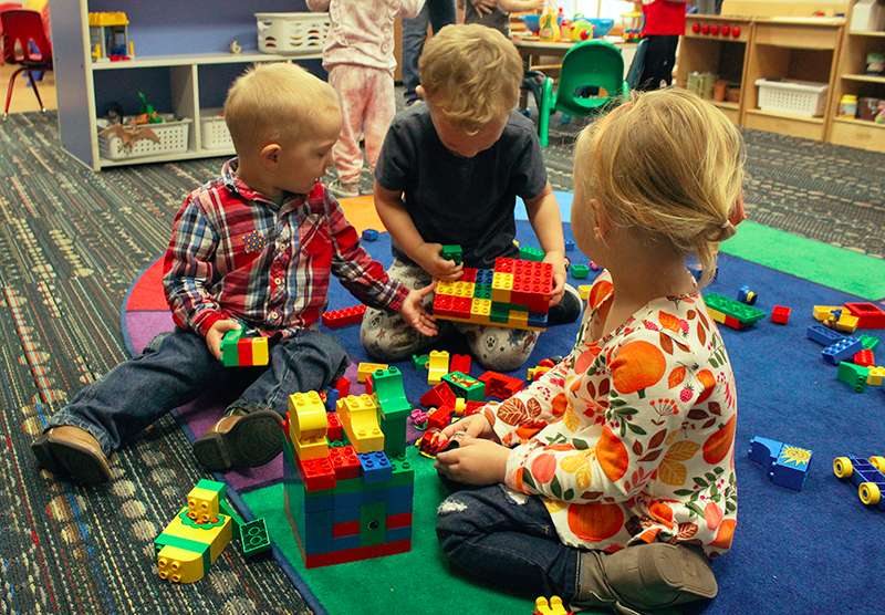 Children play recently at the Hays Area Children's Center. The Child Care Task Force of Ellis County is trying to increase child care capacity in the area. Photo by Cristina Janney/Hays Post<br>