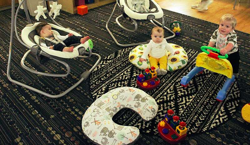 Babies get ready for nap time in the infant room at the Hays Area Children's Center. Photo by Cristina Janney/Hays Post<br>