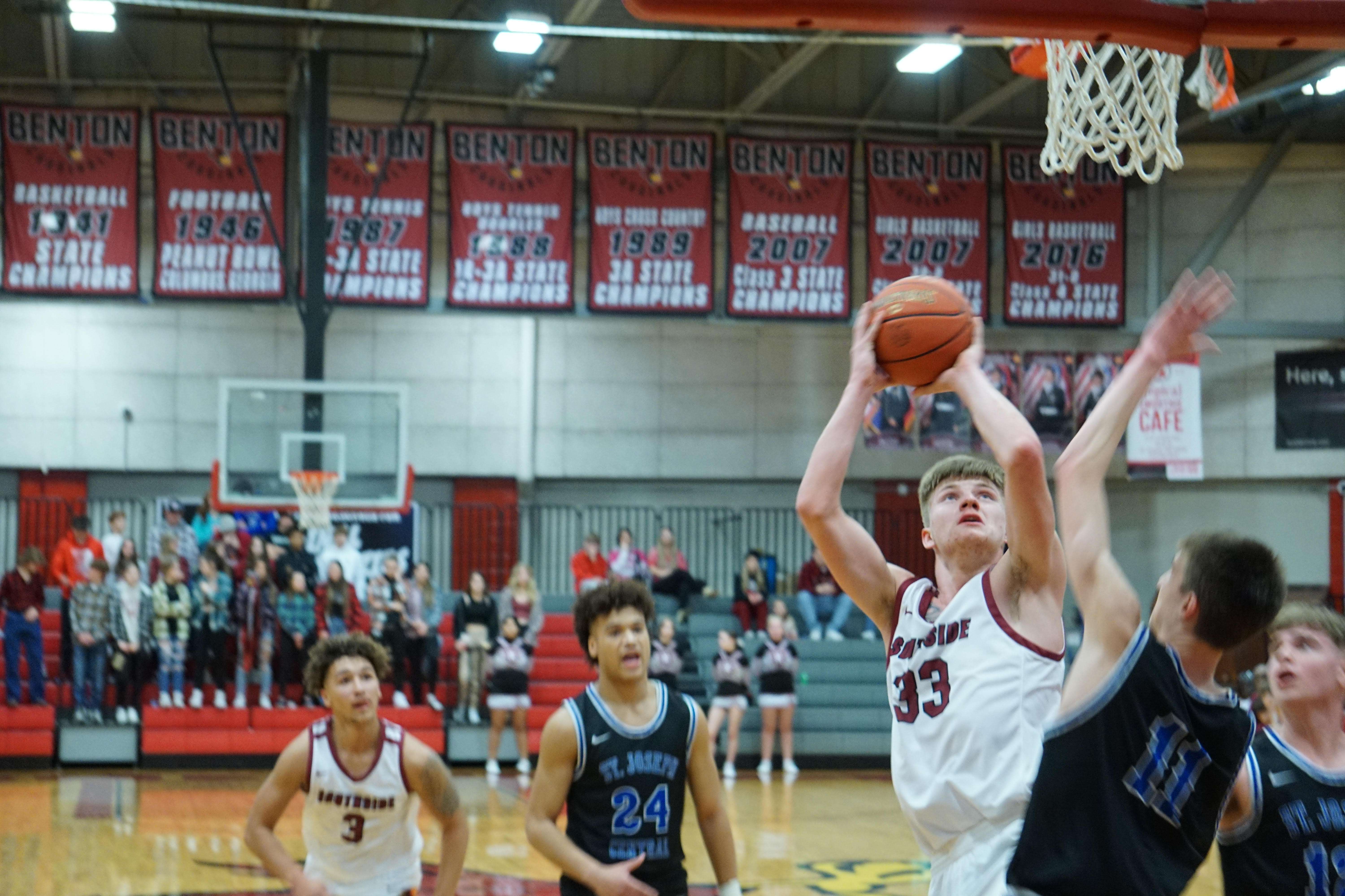 Benton's Denver Doman (33) goes up for a shot Saturday. Photo by Riley Boyd.