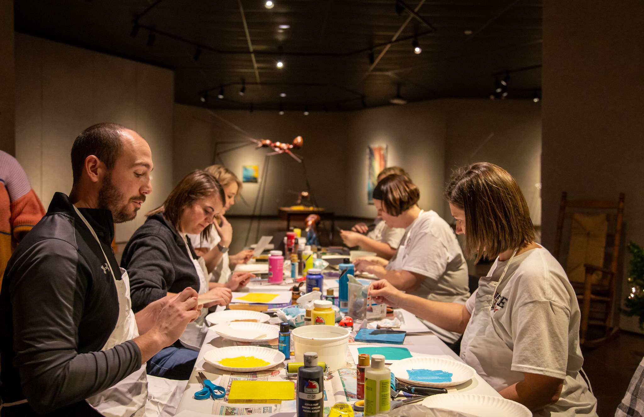 Teacher of the Year Nominees work on an art project in The Shafer Gallery last Tuesday on the Barton Campus.