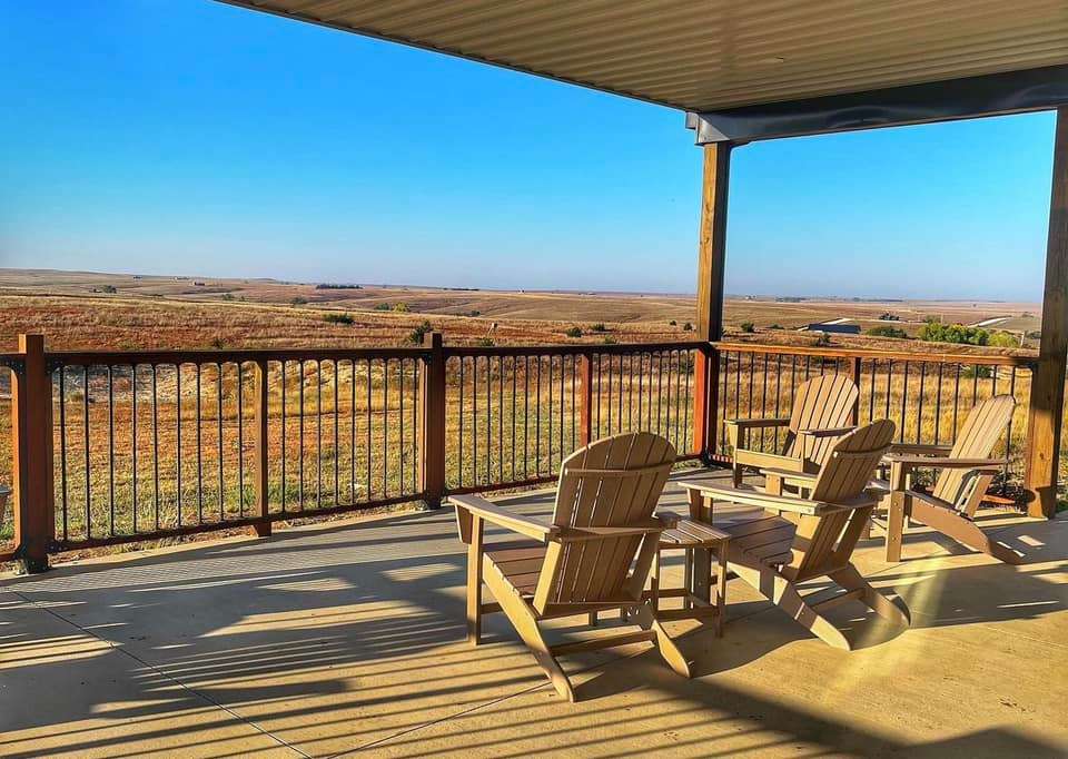 Prairie Breeze Lodge, in rural Ellis County, has a covered deck with views of the surrounding Kansas prairie. Courtesy photo