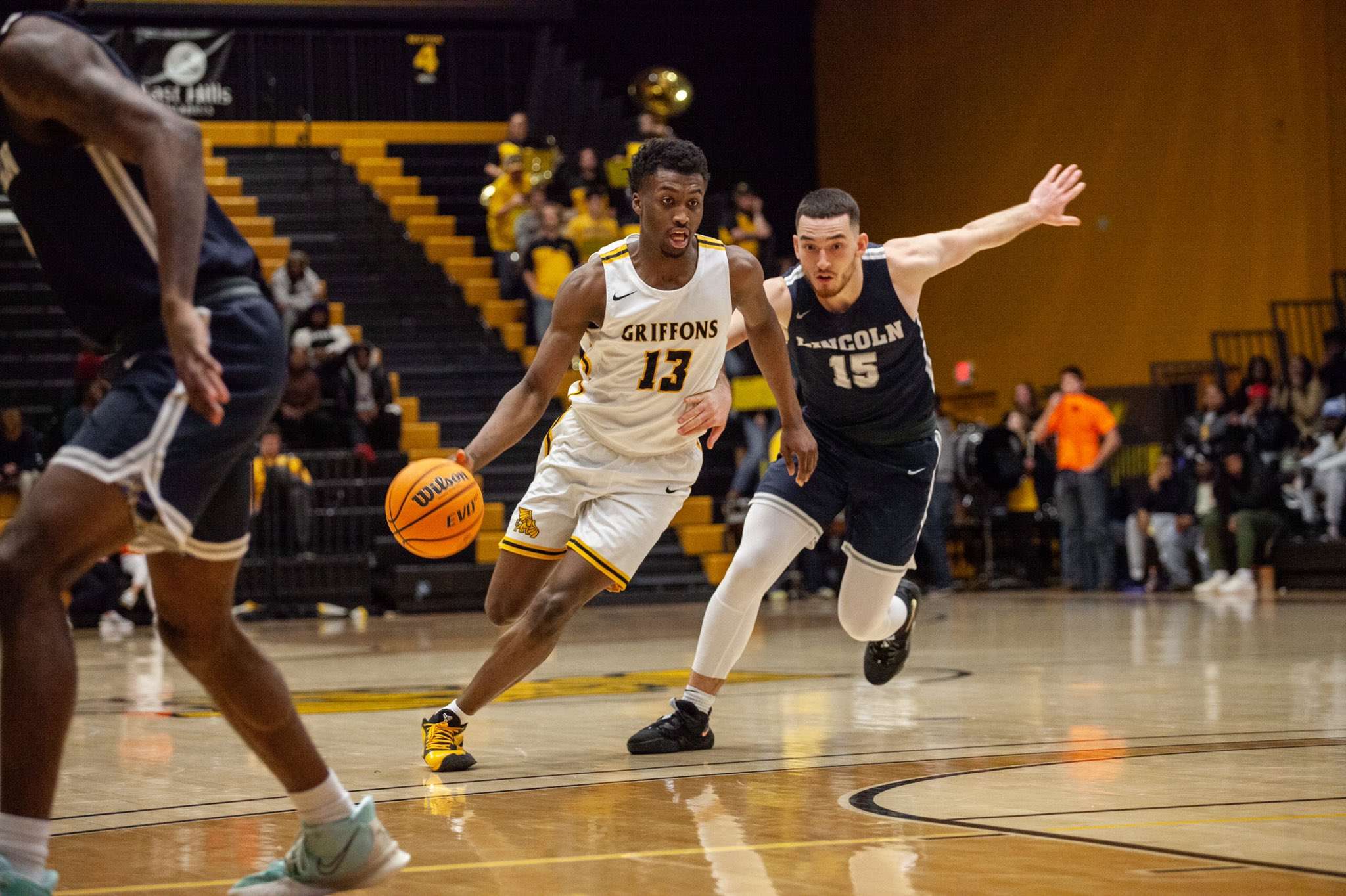 Missouri Western's Taye Fields (13) dribbles up the floor during the Griffons' 70-56 loss to Lincoln at home Thursday. Photo by Arianne Boma.