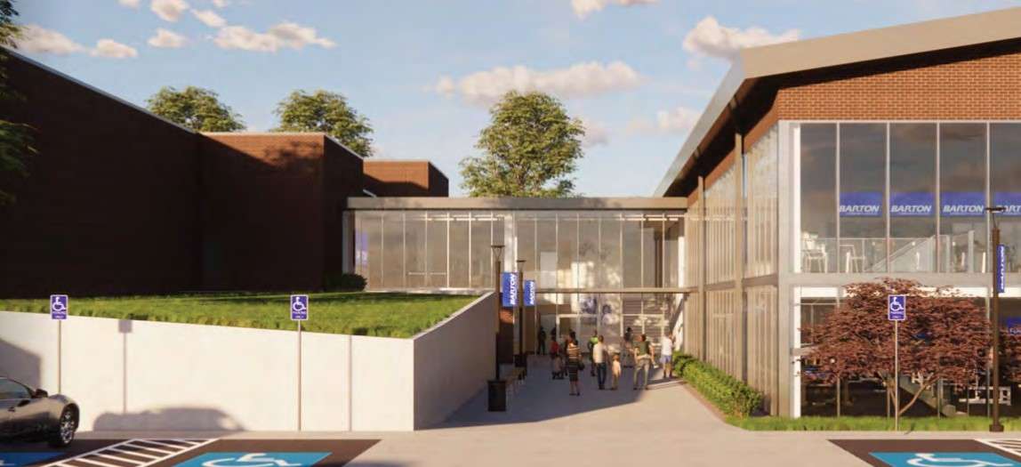 Rendering - View from the west to the east from the parking lot toward the new main entrance