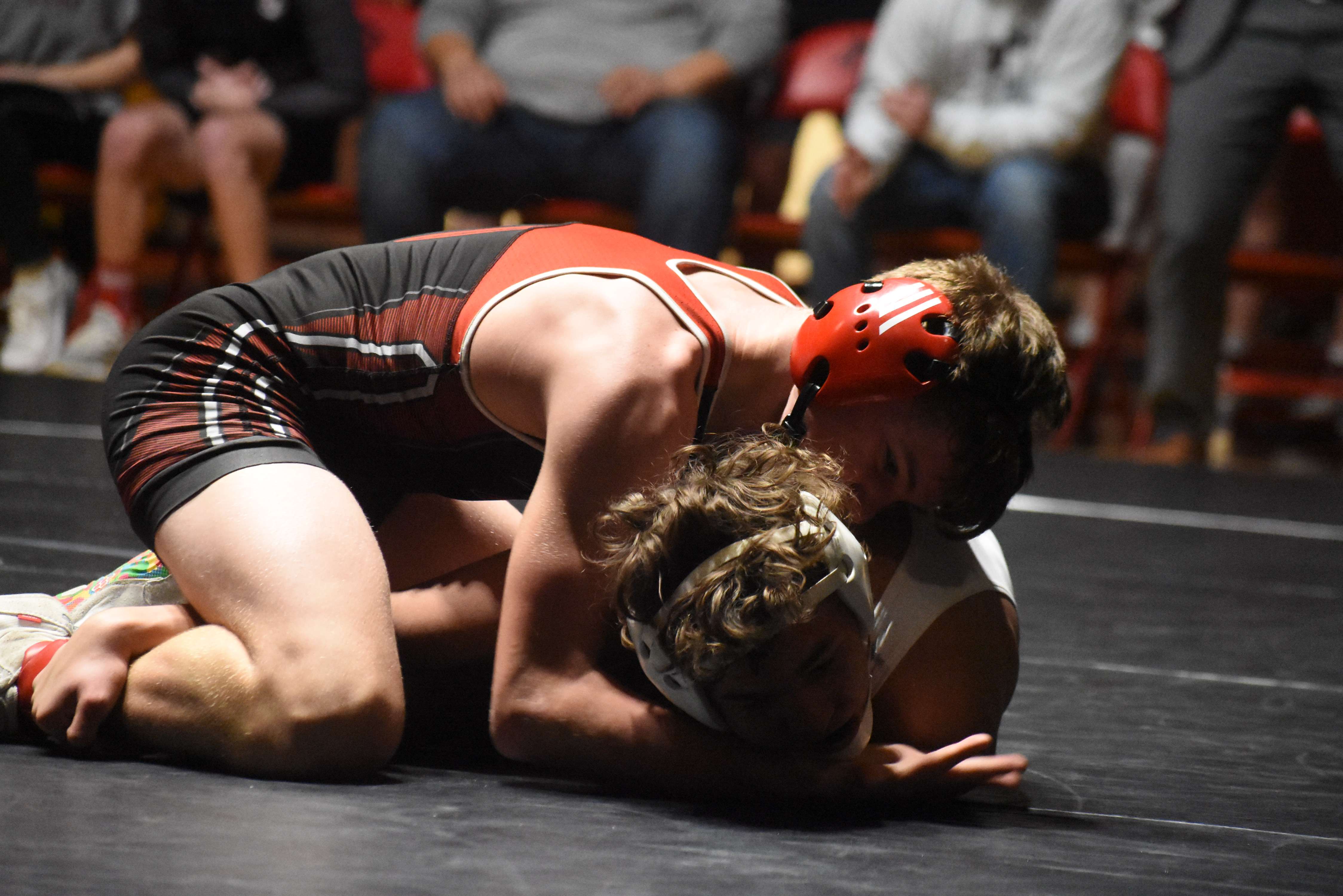 Hayden Kelly picked up a late pin against Garden City's Logan Avalon Monday at home, but the Panthers fell to the No. 2 Buffaloes 42-36 in dual action.