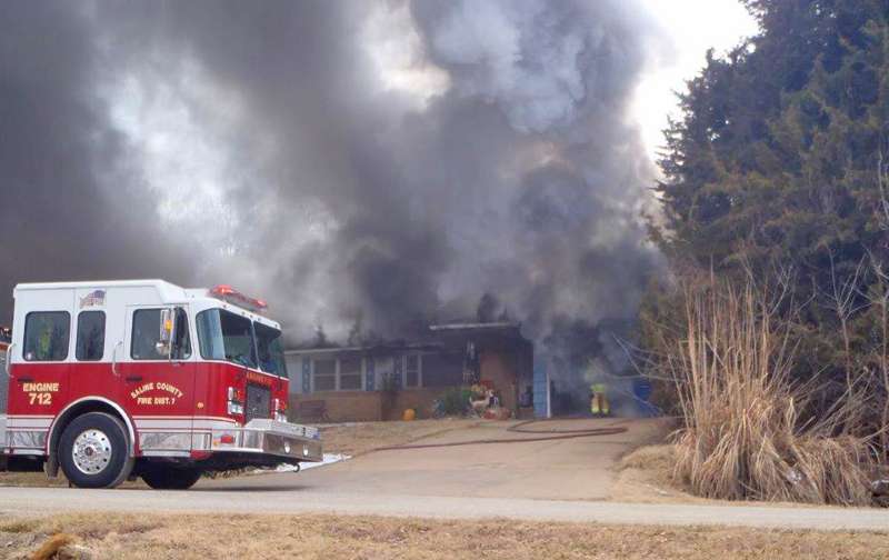 <b>Rural Fire District No. 7 firefighters work to extinguish the blaze.</b> Photos courtesy Saline County Sheriff's Office