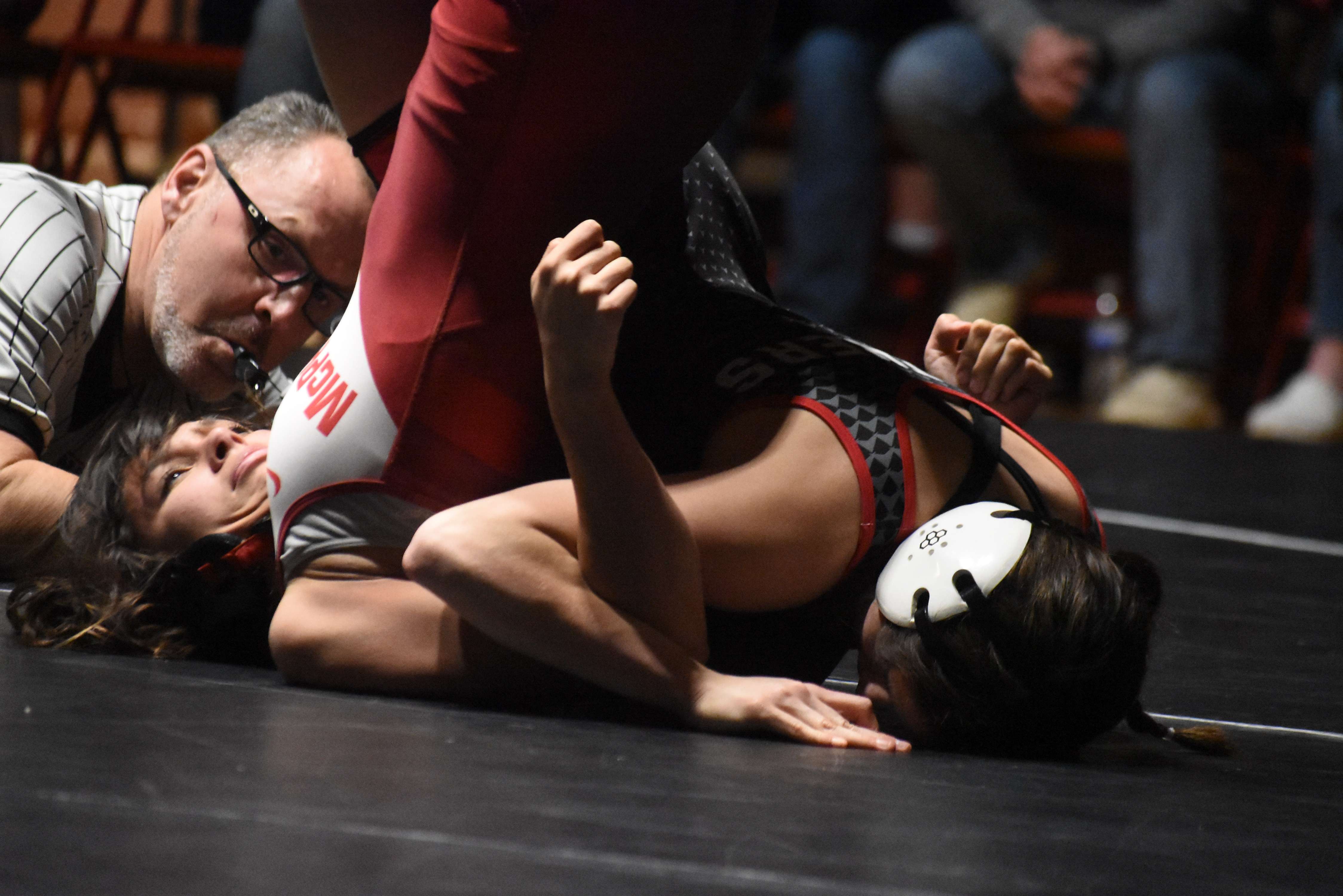 Third-ranked Daizy Gomez was one of five Lady Panthers to win by fall during Tuesday's home finale against McPherson.