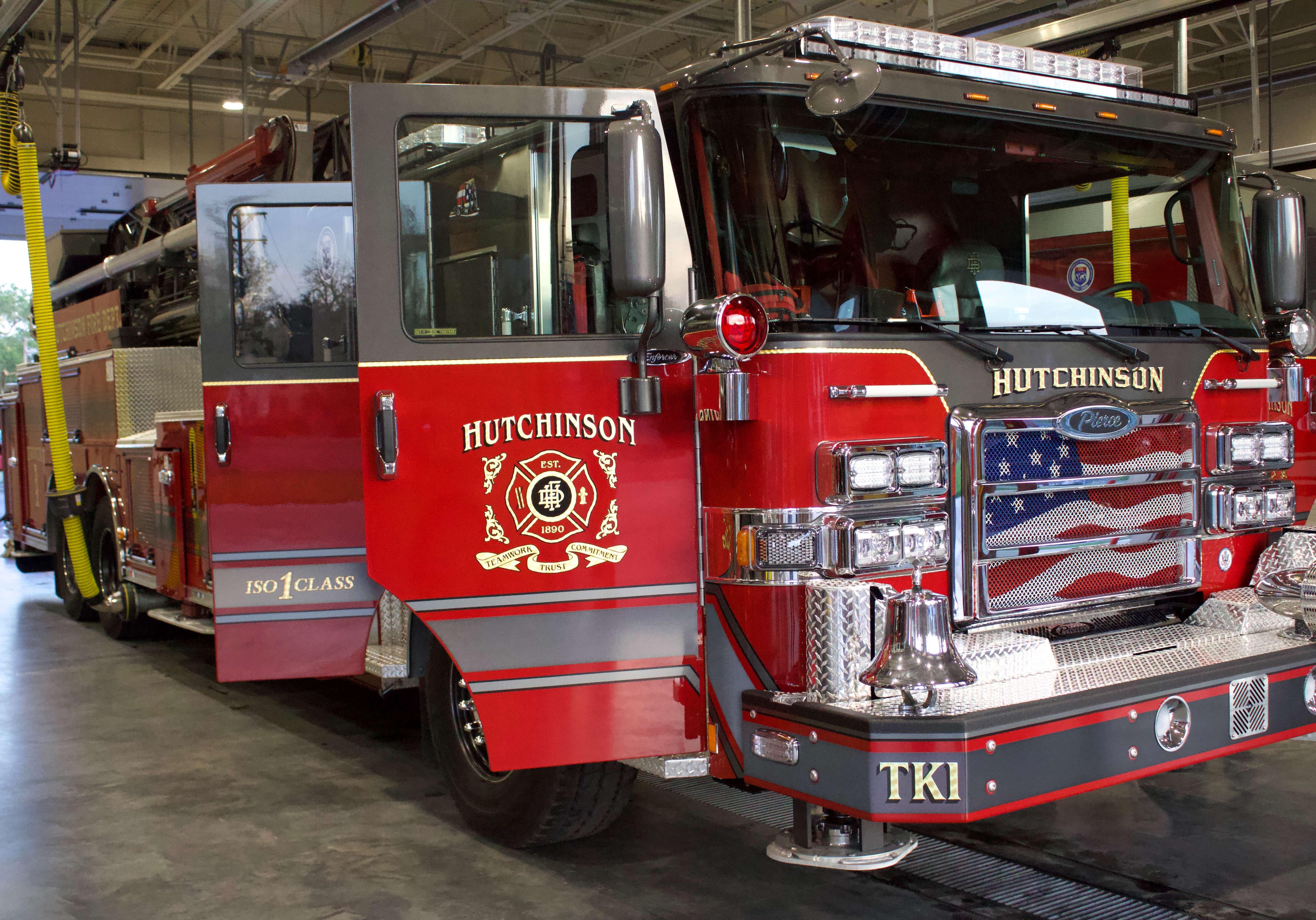 The Hutchinson Fire Department commemorated the receipt of their new fire truck Monday evening at its new home at Fire Station One on North Main Street. Photo by Emmie Boese.