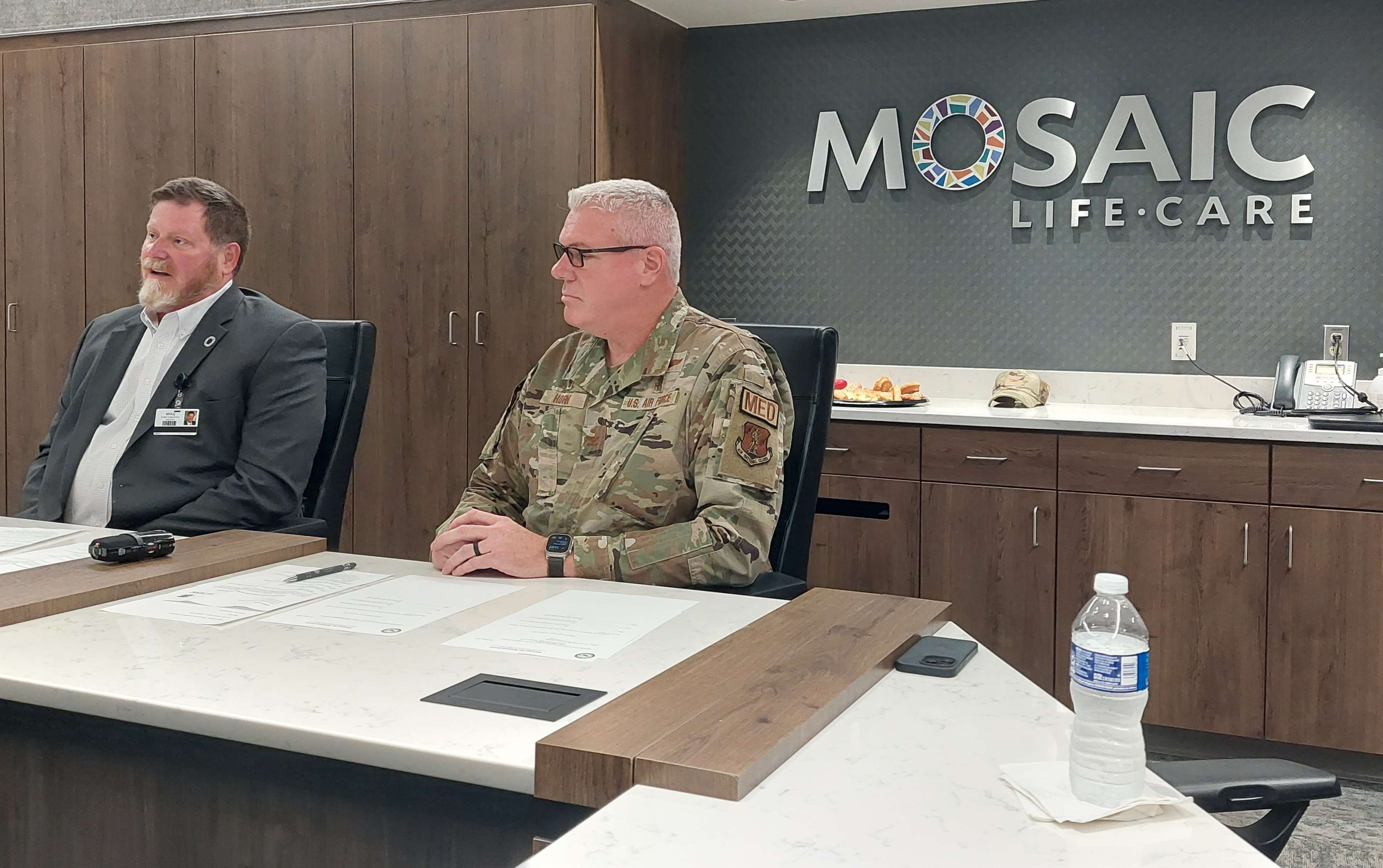 Mosaic Life Care CEO Mike Poore (left) and Colonel Jason Horn Commander of the 139th Medical Group (right) talk about a new partnership between the two entities/Photo by Matt Pike