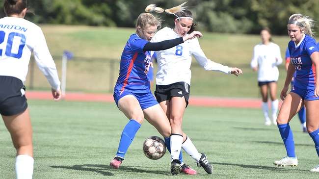 Blue Dragon defender Maielle Harnisch battles for possession in the first half as No. 10 Hutchinson falls to No. 7 Barton 3-2 on Sunday in Great Bend. (Steve Carpenter/Blue Dragon Sports Information)