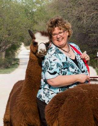 Princess the alpaca and Vickie Vandement. <b>KSRE Photo</b>
